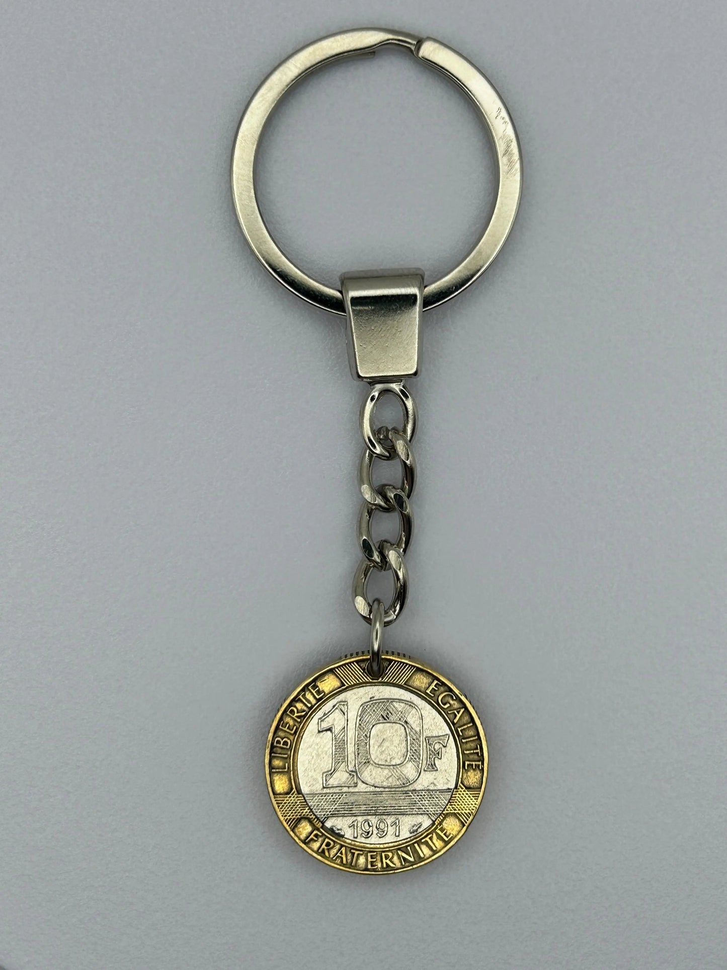 Porte-clés en pièce de monnaie 10 francs Génie de la Bastille, unique et artisanal