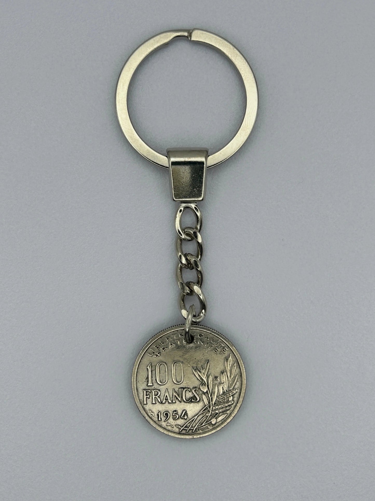 Porte-clés en pièce de monnaie 100 francs Cochet artisanal et authentique