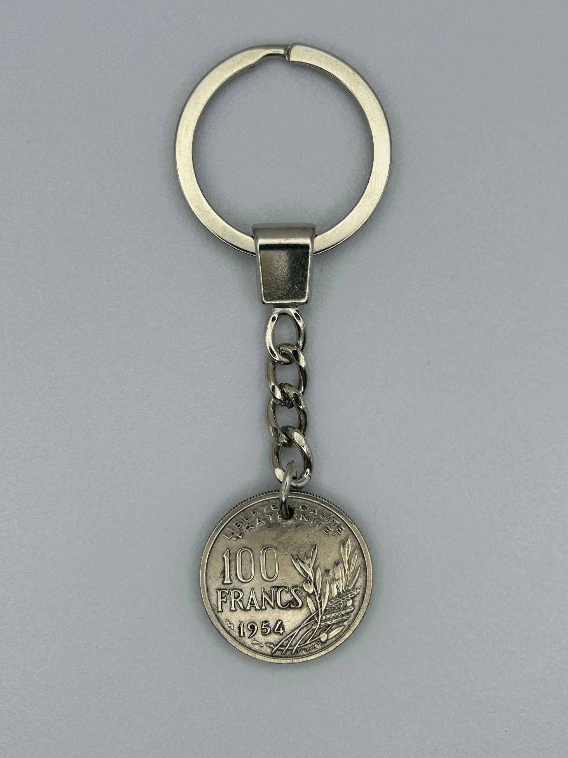 Porte-clés en pièce de monnaie 100 francs Cochet artisanal et authentique