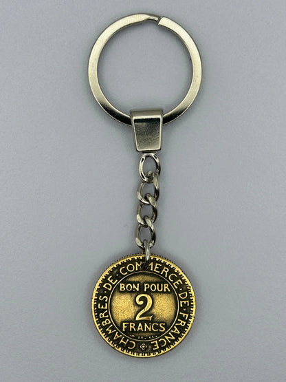 Porte-clés en pièce de monnaie 2 francs Chambre de Commerce, unique et artisanal.