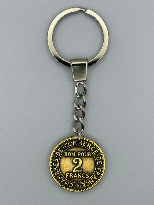 Porte-clés en pièce de monnaie 2 francs Chambre de Commerce, unique et artisanal.