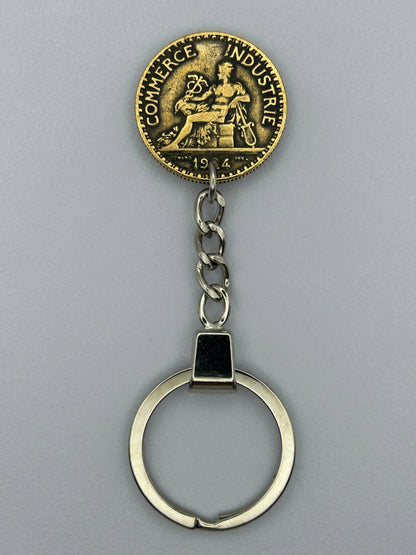 Porte-clés en pièce de monnaie, pratique et décoratif pour collectionneurs.

