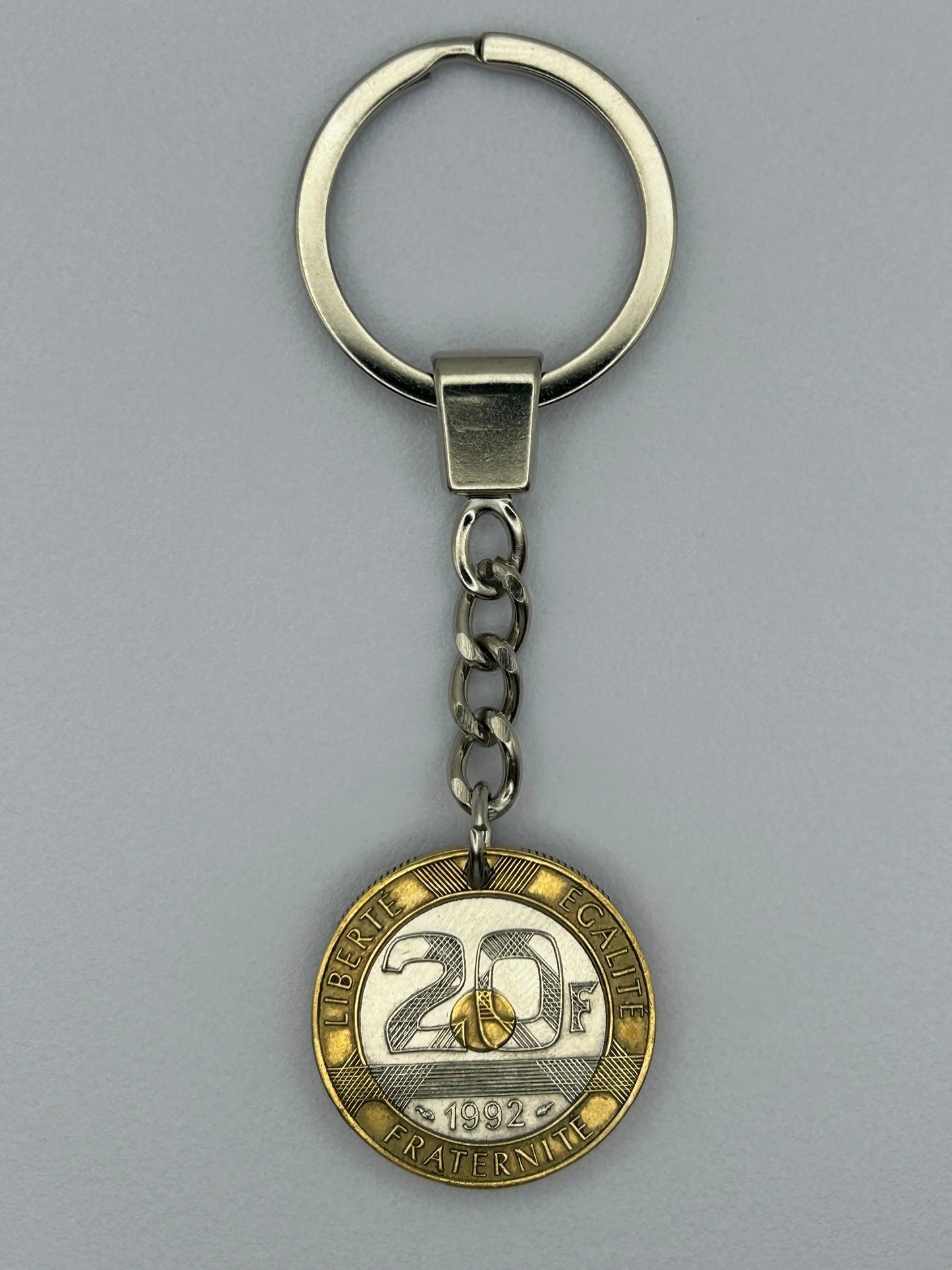 Porte-clés en pièce de monnaie 20 francs Mont Saint-Michel artisanal et unique