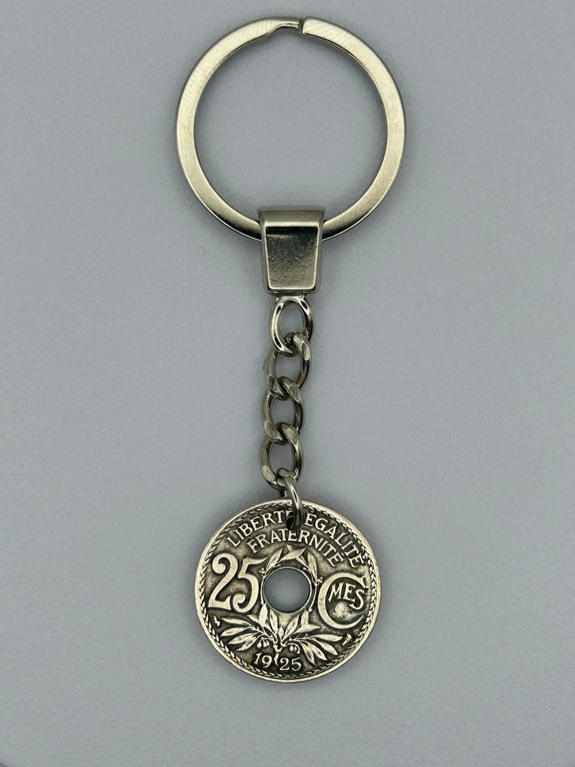 Porte-clés en pièce de monnaie 25 centimes Lindauer artisanal et unique